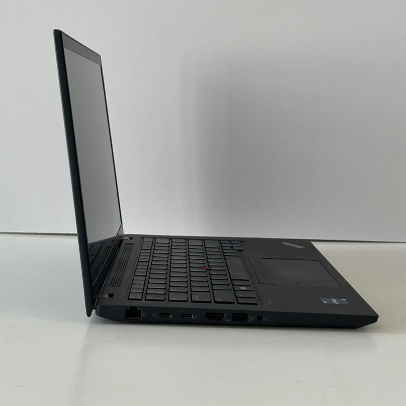 Black laptop on a white surface with a white background