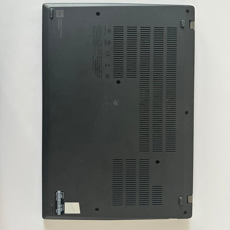 Black laptop on a white surface with a white background